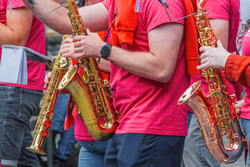 In a street orchestra, I played saxophone