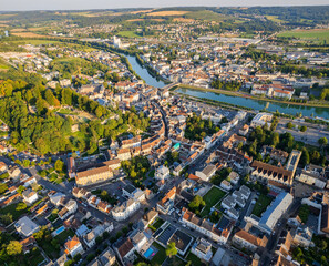 An Aerial panoramic view with pan of the old town around the city Château-Thierry in France on a...