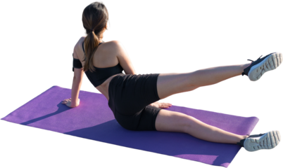 A sporty slim girl in leggings and a top resting between exercises.