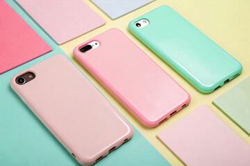 Pastel Pink and Mint Green Smartphone Cases on Colorful Background