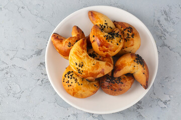 From Turkish cuisine; Moon pie is very delicious. moon pogaca or moon coregi - Turkish name; Ay boregi ya da ay coregi