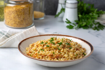 Traditional delicious Turkish food, bulgur pilaf with vermicelli (Turkish name; arpa sehriyeli bulgur pilavi)