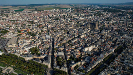 An Aerial panorama view with pan of the old town around the city Reims in France on a sunny spring...