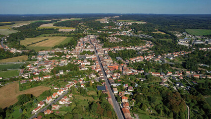 An Aerial panorama view with pan of the old town around the city Saint-Menehould in France on a...