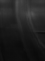 Dark surface of frosted glass with straight line pattern.