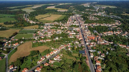 An Aerial panorama view with pan of the old town around the city Saint-Menehould in France on a...