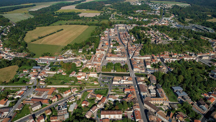 An Aerial panorama view with pan of the old town around the city Sainte-Menehould in France on a...