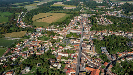 An Aerial panorama view with pan of the old town around the city Sainte-Menehould in France on a...