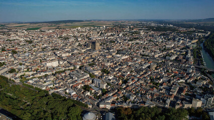 An Aerial panorama view with pan of the old town around the city Reims in France on a sunny spring...