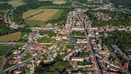 An Aerial panorama view with pan of the old town around the city Sainte-Menehould in France on a...