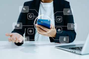 Digital marketing media in virtual screen.businesswoman hand working with mobile phone and modern...