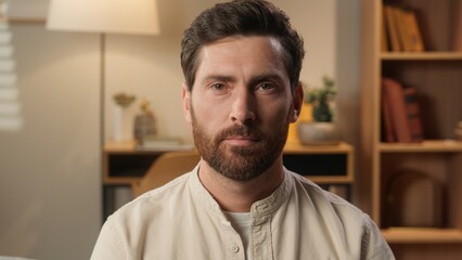 Obraz premium Portrait thoughtful calm middle-aged guy Caucasian man male homeowner tenant businessman in living room relax on sofa couch pensive think looking at camera apartment loan mortgage home health medicine
