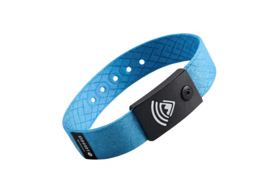 Close up of a light blue wearable device with a black sensor and white logo on a black background