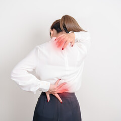 Business woman having back body ache for concepts of Back Muscle Strain, Piriformis Syndrome, Low...