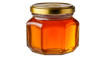 A hexagonal glass jar filled with golden amber honey and sealed with a shiny gold lid isolated on transparent background