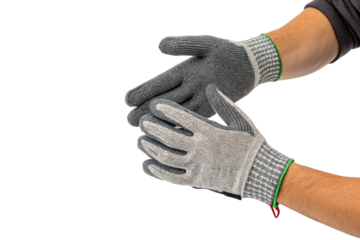 A pair of hands wearing gray and white work gloves against a black background in a studio shot