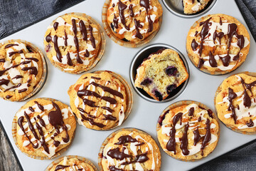 tasty blueberry muffins with lemon chocolate glaze
