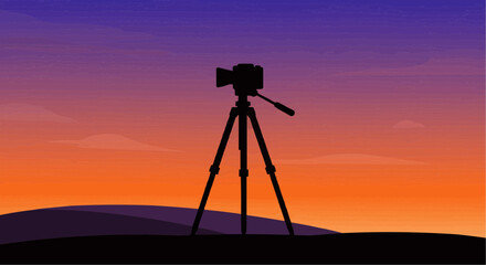 Camera on tripod at sunset.
