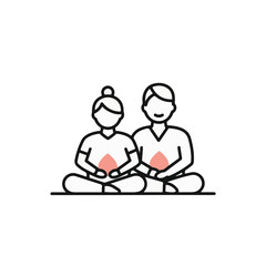 Two people meditating in a peaceful pose.