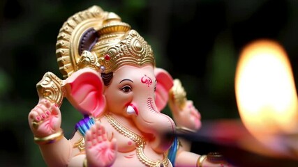 Indian wedding invitation with a adorned Ganesh statue and lit diya, perfect for creating elegant and culturally rich event invitations.