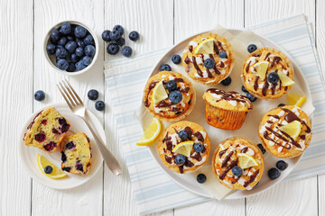 tasty blueberry muffins with lemon chocolate glaze