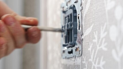 Learn the step-by-step process of installing a new light switch using a screwdriver. This tutorial provides clear guidance for anyone looking to upgrade their electrical setup at home.