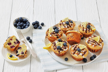 tasty blueberry muffins with lemon chocolate glaze