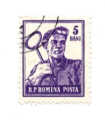A vintage postage stamp from Romania isolated on a white background.
