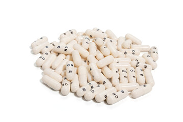 A heap of white pharmaceutical capsules labeled 40 OM on a clean white background. The image is ideal for illustrating medication, dosage, or health concepts.