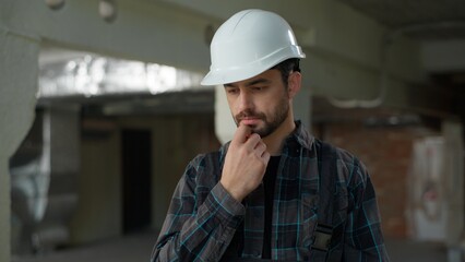 Man inspector builder holding measure ruler male repairman Caucasian guy on construction site...