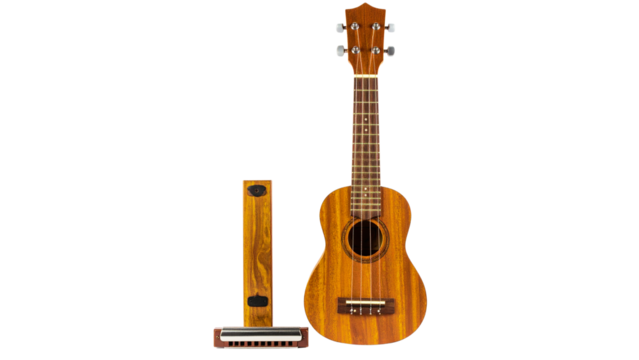 A classic wooden acoustic guitar with six strings is isolated on a clean white background