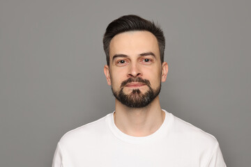 Fototapeta premium Handsome man before shaving on grey background