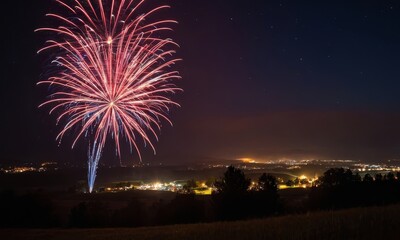 Spectacular fireworks illuminating a night sky above a festive town celebration