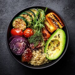 Healthy quinoa bowl with grilled vegetables avocado and red onion