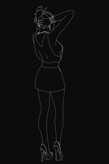 A stylish woman in a sleek black dress poses confidently with her hands on her head, standing against a dark background. Her high heels enhance her elegant silhouette, creating a striking contour.