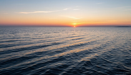 Obraz premium Dawn on the water of a huge lake.