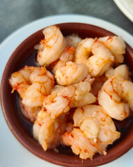 close-up of hot shrimp, traditional spanish tapas dish, fresh and spicy seafood appetizer, vibrant colors.