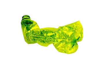 Crumpled green plastic bottle is isolated.