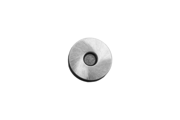 Round silver magnetic snap fastener for bags is isolated.