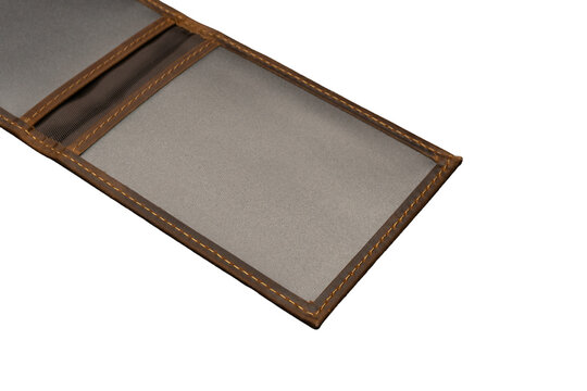 Brown leather wallet with transparent card slots is isolated.
