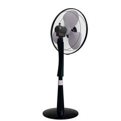 A black pedestal fan with a three-bladed, off-white plastic fanhead, stands on a circular base, angled slightly to the left. The stand is slender and features a slight curve near the base. 