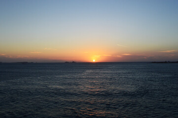 Sunset over the sea in Santorini island Greece
