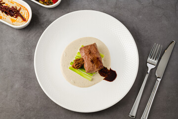 Tender beef medallion served with morel mushrooms and creamy sauce