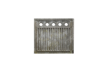 Old concrete fence panel with vertical grooves and round holes row at the top is isolated.