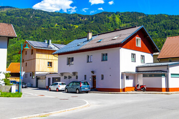 Austria Landeck city town with tourist streets people old buildings.
