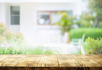 Beautiful pine wood texture  tabletop with a bright, natural blurred and home wall background.For showcasing product or presentation.