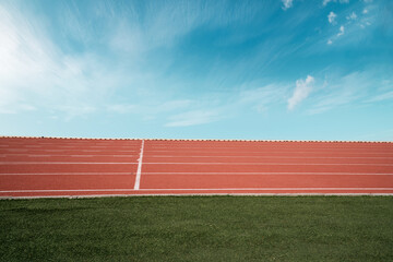 Empty athlete track or running track with blue sky.