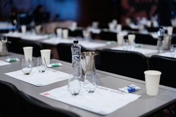 Tables prepared for an engaging event featuring refreshments and drinks