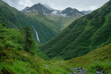 Naklejka premium Close-up of a stunning waterfall with rising mist