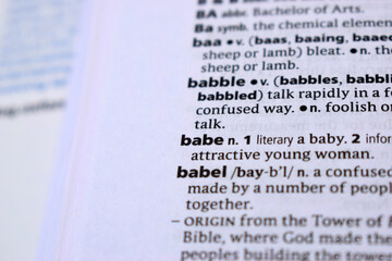 Close Up Of English Dictionary Page With Definition Word -Babe